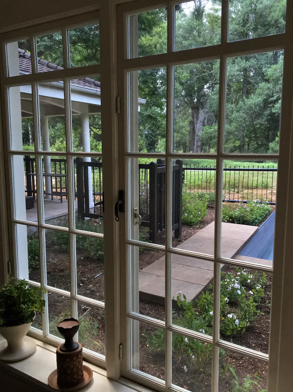 Crystal clear glass French doors looking out to a garden